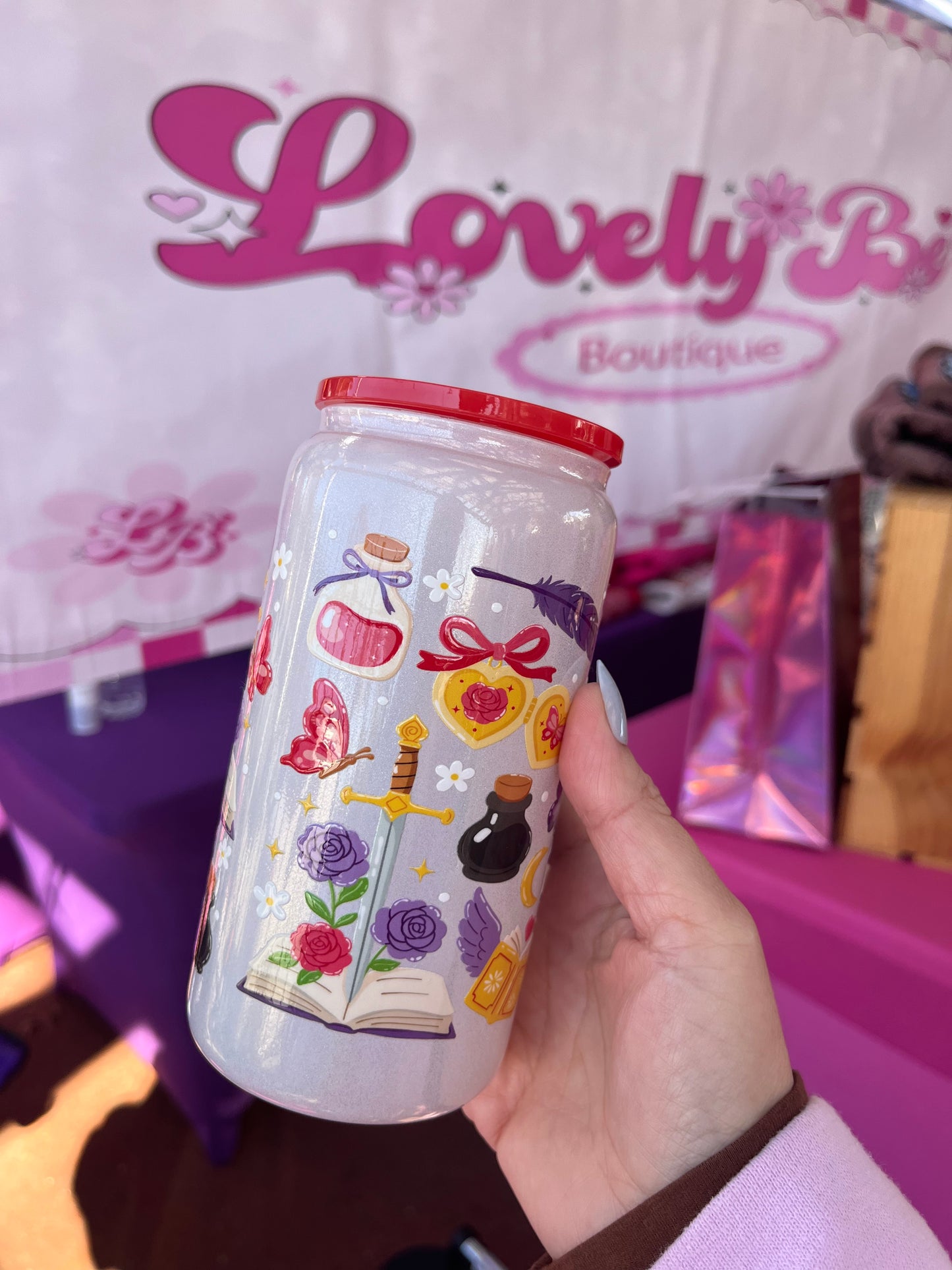 Dragons, dreams, and books glass cup 