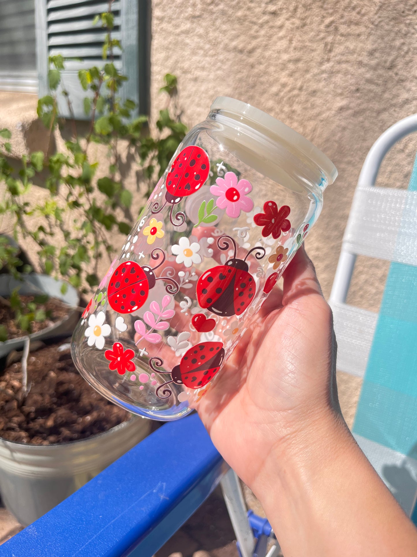 Cute daisies and lady bugs glass cup