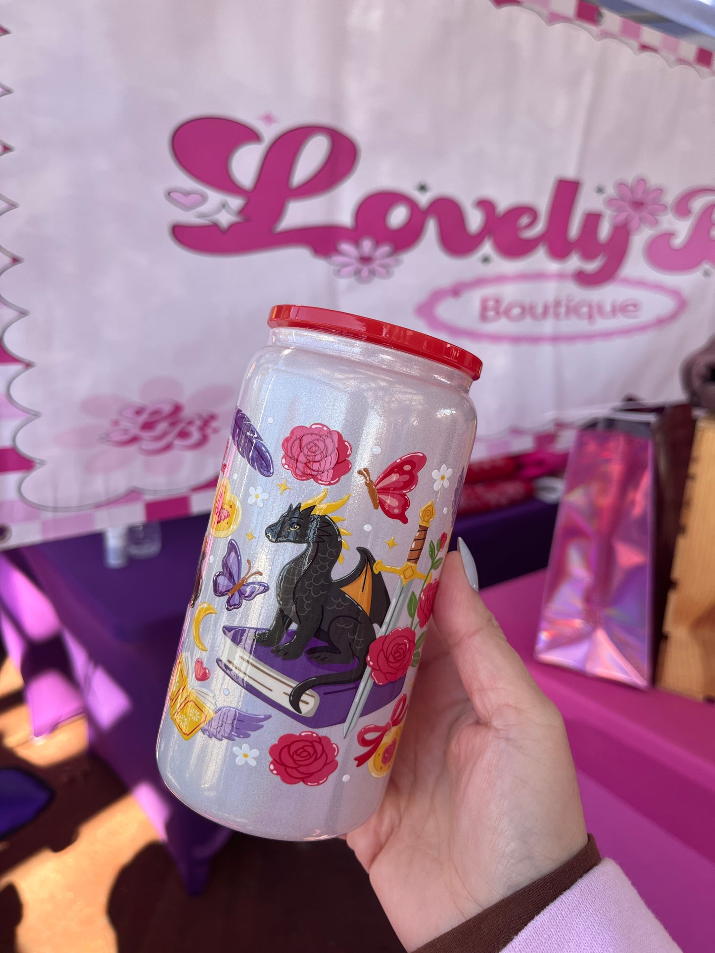 Dragons, dreams, and books glass cup ￼