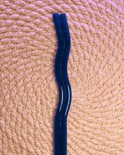 Dark colored assorted wavy glass straws