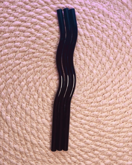 Dark colored assorted wavy glass straws